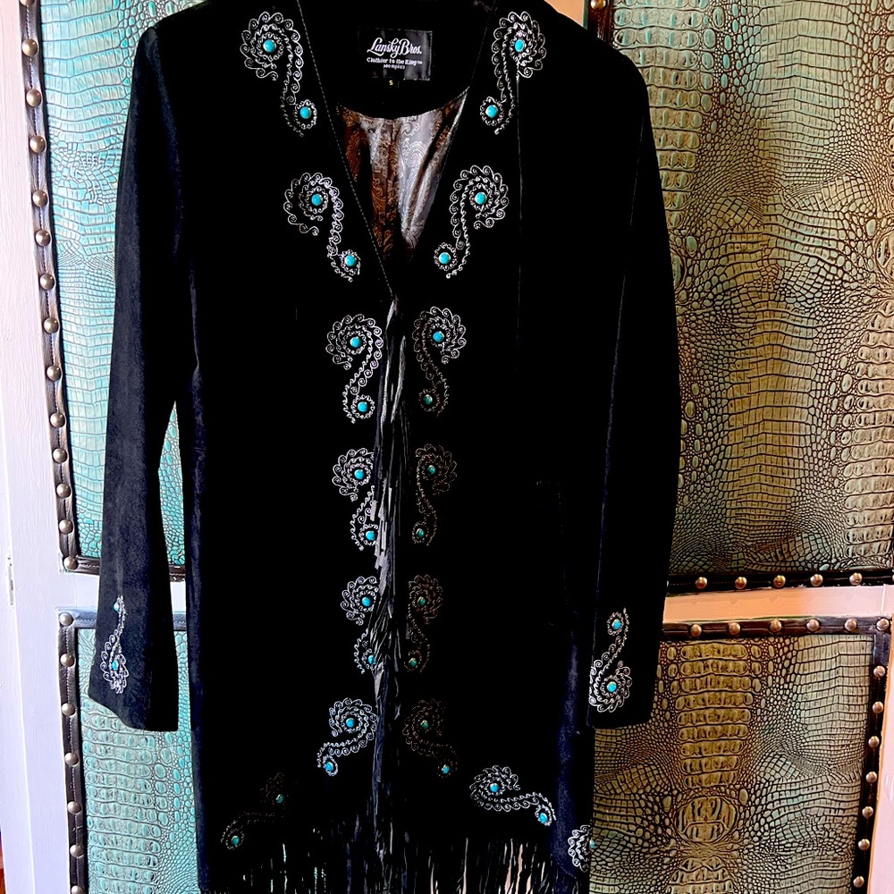 suede coat with topaz embellishments & grey paisley silk lining.